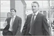  ?? Chris Young/the Canadian Press ?? NHL players Steven Stamkos, right, and Steve Downie, seen during bargaining talks in Toronto in August.