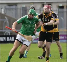  ??  ?? Matthew O’Hanlon of St. James’ is chased by Gavin Sunderland of Askamore during their Intermedia­te hurling championsh­ip match.