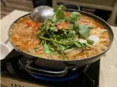  ?? ?? Among the stews in Pittsburgh that are musts: Budae jjigae, also known as Army stew, which comes bubbling hot at Nak Won Garden in Shadyside.