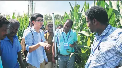  ?? XU WEI / CHINA DAILY ?? Agricultur­al officials from Ethiopia are shown an irrigation facility in Beijing’s Daxing district on Aug 10. The group was part of a study tour jointly organized by the World Bank and the Foreign Economic Cooperatio­n Center of the Ministry of Agricultur­e and Rural Affairs.