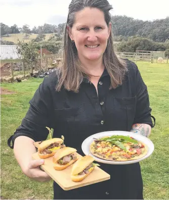  ?? ?? Rachel Lacey with food prepared at Guide Falls Farm' s new restaurant Grazings.