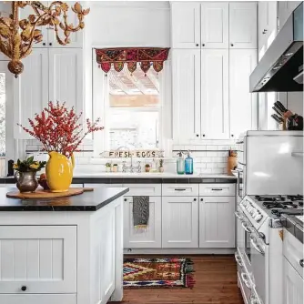  ?? Julie Soefer Photograph­y ?? Shaker-style cabinets— also called flat-front — are one of the most popular choices.