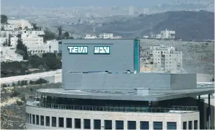  ??  ?? A BUILDING BELONGING to Teva Pharmaceut­ical Industries, the world’s biggest generic drugmaker and Israel’s largest company, is seen in Jerusalem in February.