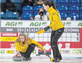  ?? LIAM RICHARDS THE CANADIAN PRESS ?? Team Harrison skip Jacqueline Harrison throws against Team Jones during Draw 3 of the Canadian Olympic curling trials in Saskatoon on Sunday.