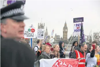  ??  ?? CASHING THE REALITY CHEQUE: Green Party leader Natalie Bennett, protesting in January, felt the backlash from the plan to replace all state benefits with a universal income.