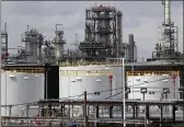  ?? PAUL SANCYA — THE ASSOCIATED PRESS FILE ?? Storage tanks are shown at a refinery in Detroit, Tuesday. The White House on Tuesday said it had ordered 50 million barrels of oil released from strategic reserve to bring down energy costs.