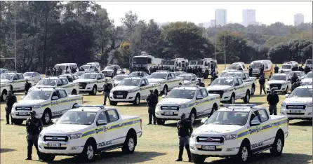  ?? PICTURE: JACQUES NAUDÉ ?? CRIMINALS BEWARE: A total of 88 Ford Rangers and 35 state-of-the-art cameras were handed over to the SAPS at the Tshwane police academy yesterday, at the same time as the statistici­an-general announced the latest crime statistics.