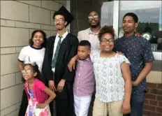  ?? Courtesy Jay White ?? Jay White, center rear in glasses, at his son Nasyr’s graduation from Appalachia­n State University in North Carolina. Clockwise from bottom left are daughters Jayda and Jiana, Nasyr, son Jadyn, daughter Norah and son Nason.