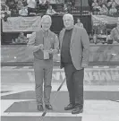  ?? ?? Former Ohio State football coach Jim Tressel poses for a photo with OHSAA executive director Doug Ute after being honored Saturday as part of the OHSAA’s Circle of Champions program.