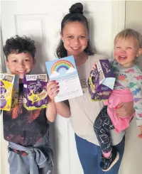  ??  ?? ●●Charlie, Eva-Leigh and Rosie Marshall with their Easter eggs