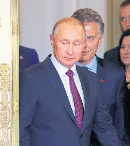  ?? MARCOS BRINDICCI/ReuteRS ?? Putin se reunió con Macri y compartier­on una cena en la Casa Rosada