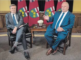  ?? TIJANA MARTIN
THE CANADIAN PRESS ?? Toronto Mayor John Tory meets with Ontario Premier Doug Ford at Queen's Park on Monday.