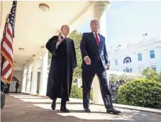  ?? JIM LO SCALZO, EUROPEAN PRESSPHOTO AGENCY ?? President Trump, here with Supreme Court Justice Anthony Kennedy, made 10 nomination­s Monday to federal courts.