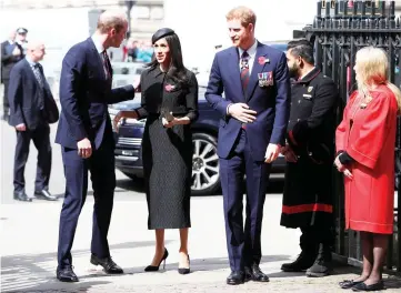  ?? — Reuters photo ?? Britain’s Prince William greets his brother Harry’s fiancee Meghan Markle as they arrive for an ANZAC day service at Westminste­r Abbey in London late last month.