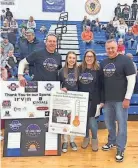  ?? NATALIE GRAY ?? Olentangy Liberty student Natalie Gray is flanked by Natalie Gray Foundation board President Chris Marston (left) and foundation board members Melanie Farkas and Shawn Wagner. The foundation raises money for research and funding to treat pediatric brain cancer.