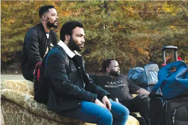  ?? FX VIA TNS ?? From left, Lakeith Stanfield as Darius, Donald Glover as Earnest Marks and Brian Tyree Henry as Alfred Miles in the FX series “Atlanta Robbin’ Season.”