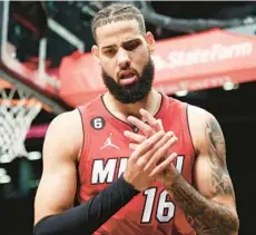  ?? JESSIE ALCHEH/AP ?? For all of the Heat’s contracts that have gone south, Caleb Martin has provided a positive payoff with his play in a variety of roles. Here, he gestures after a foul against the Brooklyn Nets on Feb. 15 in New York.