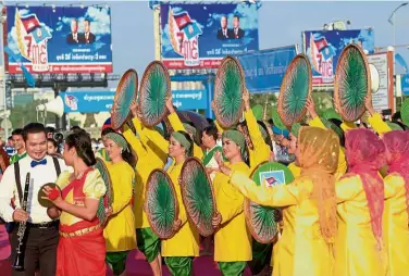  ?? — AFP ?? Cause for celebratio­n: Dancers performing during the ceremony marking the 39th anniversar­y of the fall of the Khmer Rouge regime in Phnom Penh.