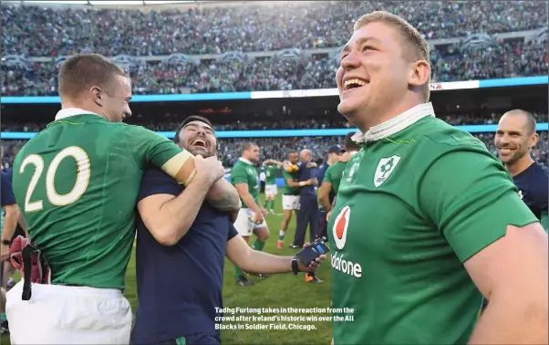  ??  ?? Tadhg Furlong takes in the reaction from the crowd after Ireland’s historic win over the All Blacks in Soldier Field, Chicago.