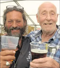  ??  ?? Rick Stephens and George Barton found themselves in the beer tent at last year’s event