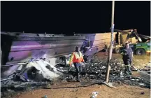  ??  ?? DEATH SCENE: The aftermath of the horrific road accident near Bronkhorst­spruit when a truck and a taxi collided, killing 20 people, including 18 children