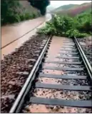 ??  ?? DANGER: Flooding on the line before the derailment tragedy