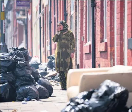  ??  ?? > Last year’s bin strike in Birmingham left piles of rubbish strewn across the city and cost the council millions