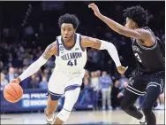  ?? Laurence Kesterson / Associated Press ?? Villanova’s Saddiq Bey (41) was the only Big East player selected in the first round of the 2020 NBA Draft last week.