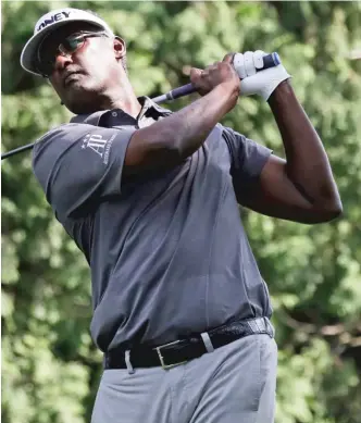  ?? AP ?? A clutch wedge shot by Vijay Singh on the second hole of a playoff set up a short birdie putt.