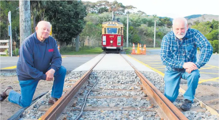  ?? Photo / David Haxton ?? Henry Brittain, left, and Steve Porter by upgraded tram lines.