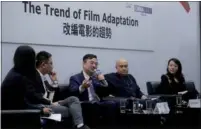  ?? ROY LIU / CHINA DAILY PROVIDED TO CHINA DAILY ?? Left: Luo Li, vice-president of China Literature (center), speaks at the forum in Hong Kong. Right: The film adapted from a fantasy romantic online novel, raked in 530 million yuan ($80 million) in box office.