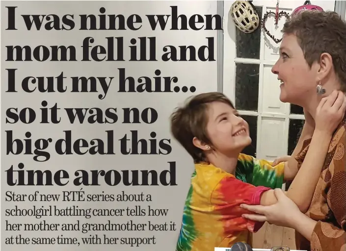  ?? ?? KiNDest cUt: Pixie-haired Beth, 9, hugs her mother Cliodhna, and left, at the premiere of Louise Lives Large