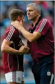  ??  ?? TOUGH LUCK: Kevin Walsh consloes Shane Walsh