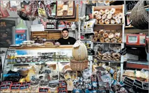  ??  ?? This densely packed salumeria is typical of the small shops that line the Spaccanapo­li.