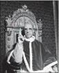  ?? THE ASSOCIATED PRESS FILE ?? Pope Pius XII, wearing the ring of St. Peter, raises his right hand in a papal blessing at the Vatican, in Sept. 1945.