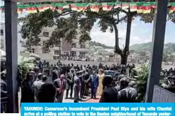  ??  ?? YAOUNDE: Cameroon’s incumbent President Paul Biya and his wife Chantal arrive at a polling station to vote in the Bastos neighborho­od of Yaounde yesterday during Cameroon’s presidenti­al election. —AFP