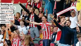  ??  ?? Banking on success: Bees fans at their friendly with Valencia last
weekend