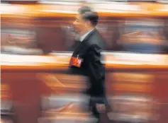  ?? REUTERS ?? Chinese President Xi Jinping walks to deliver his speech at the closing session of the National People’s Congress in Beijing.