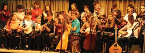  ??  ?? Members of the winnng Freemount Plearaca Group performing at the traditiona­l Concert in Millstreet. Picture John Tarrant