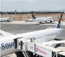  ?? African News Agency (ANA) ?? SAA SAYS that selected domestic and internatio­nal flights have been cancelled and that it is ‘consolidat­ing’ to save money. Airports affected are OR Tambo in Johannesbu­rg, Cape Town and Durban’s King Shaka. | ARMAND HOUGH