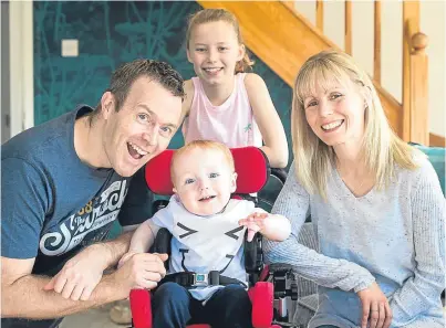  ?? Picture: Wullie Marr. ?? 18-month-old Max Farmer with his parents Elaine Donoghue and Stuart Farmer and sister Beth, 10, at home in Perth.