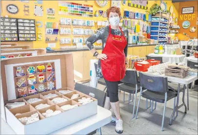  ?? Elizabeth Page Brumley Las Vegas Review-journal @Elipagepho­to ?? Gail Schomisch operates All Fired Up, a paint-your-own pottery studio in Las Vegas. She said that staying open will require the business to take out another forgivable federal Paycheck Protection Program loan.