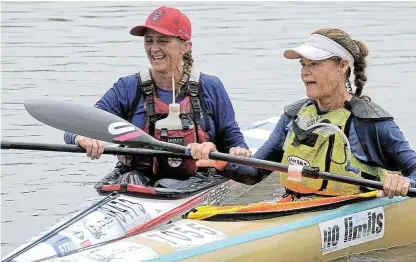  ?? Supplied ?? Consumate veteran: Lorna Oliver (red cap) and Debbie Lewis (white cap). finished the 2023 Dusi Canoe Marathon together.
/