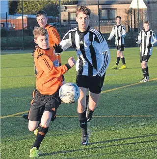  ??  ?? Broughty United Panthers U/15 (black and white) saw off Dundee United SC 3-2 in the quarter-finals of the Tommy Clark Trophy last Sunday.