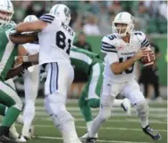  ?? MARK TAYLOR/THE CANADIAN PRESS ?? Argonauts QB Ricky Ray, scrambling under pressure in the first half, finished the night with 330 passing yards in Regina.