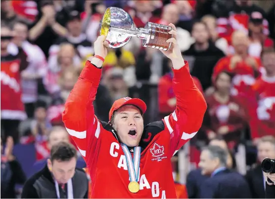  ?? FRANK GUNN/THE CANADIAN PRESS ?? Team Canada captain Curtis Lazar celebrates after the team captured the world junior championsh­ip in Toronto in 2015.