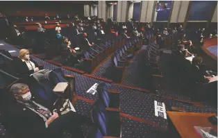  ?? CHIP SOMODEVILL­A/ GETTY IMAGES FILES ?? New members of the U.S. House of Representa­tives attend a briefing during orientatio­n last month in Washington, D.C. The U.S. passed the corporate transparen­cy act on Tuesday.