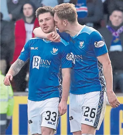  ?? Pictures: PA. ?? Left: Rangers’ Alfredo Morelos celebrates scoring his side’s first goal of the game. Above: Matty Kennedy, left, and Liam Craig after scoring Saints’ goal.