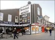  ?? Gary Coronado Los Angeles Times ?? SAN FRANCISCO restaurant­s, such as these on Pier 39, can reopen for indoor dining at 25% capacity.