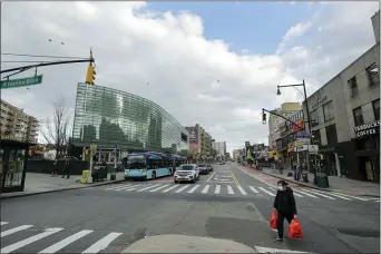  ?? FRANK FRANKLIN II — THE ASSOCIATED PRESS ?? Main Street on Wednesday in Queens, N.Y., is almost deserted.